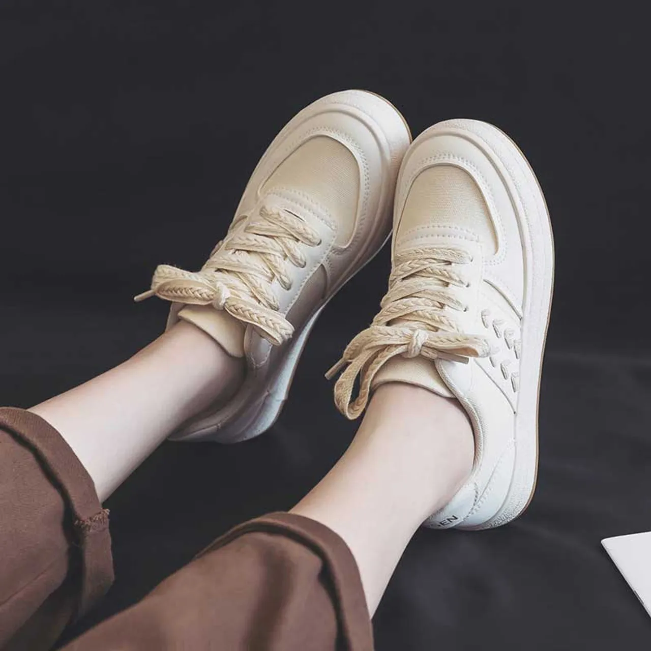 Beige arrow point accents casual shoe sneaker